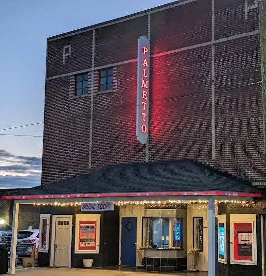 Palmetto Theatre entrance and neon sign